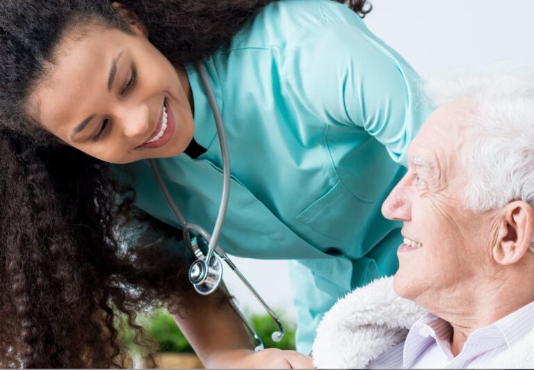 Nurse caring for elderly man