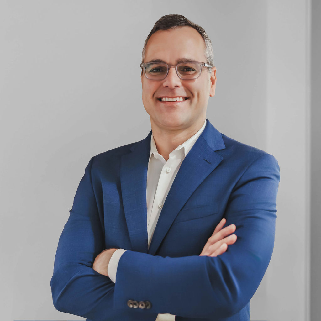 Man in business suit with glasses