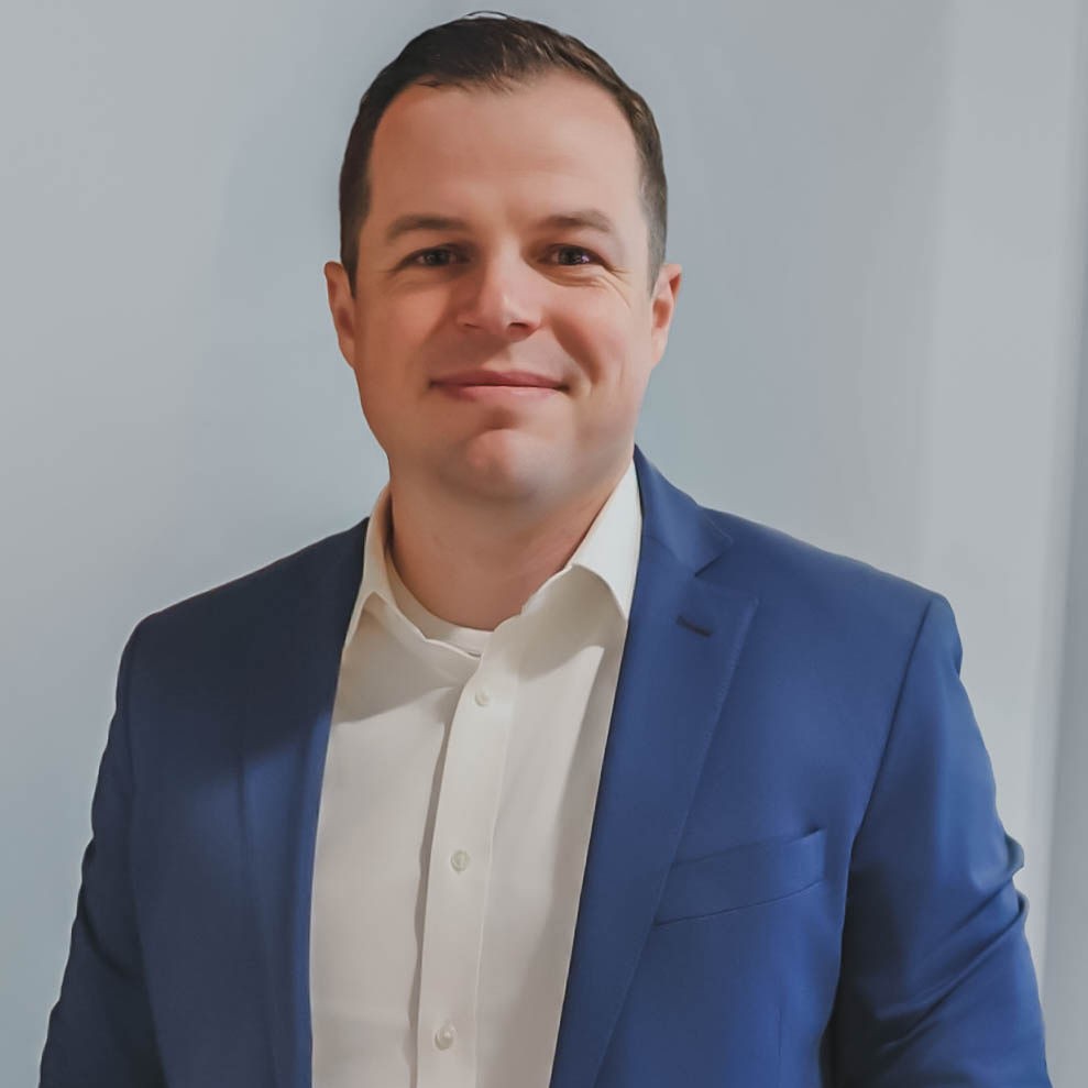 Patrick in a business suit